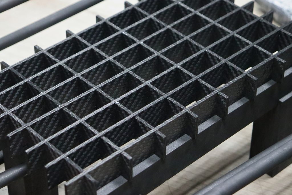 Fixture de CFC para sistemas de carga en hornos industriales